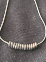 Sterling Silver "Floating Rings" on 17 in. Skinny Snake Chain