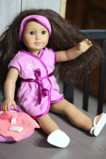 American Girl doll with many accessories