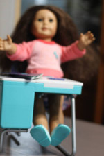 American Girl doll with many accessories