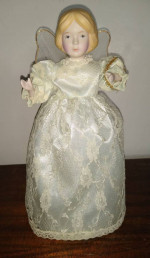 Snow angel tree topper doll