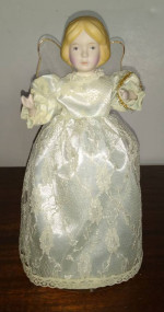 Snow angel tree topper doll