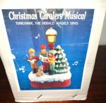 Christmas carolers musical figurine