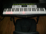 CASIO LK135 LIGHT UP TEACHING PIANO KEYBOARD WITH 100 SONGS AND MORE