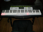 CASIO LK135 LIGHT UP TEACHING PIANO KEYBOARD WITH 100 SONGS AND MORE