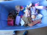 Alot of barbies and ken dolls