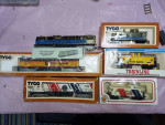 HO scale 12 wheel locomotives with matching caboose.