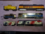 HO scale 12 wheel locomotives with matching caboose.