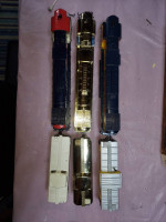 HO scale 12 wheel locomotives with matching caboose.