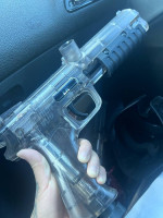 Two paintball guns with accesories