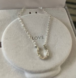 Horseshoe shaped pendant, necklace with diamonds