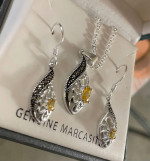 14 karat white gold earrings, and necklace shirt