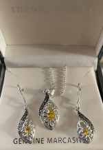 14 karat white gold earrings, and necklace shirt
