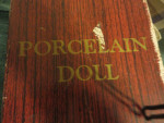 PORCELAIN DOLL