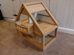 Plan Toys wooden dollhouse with furniture and people
