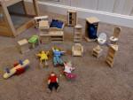 Plan Toys wooden dollhouse with furniture and people