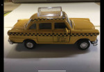 Vintage toy checker taxi pull back