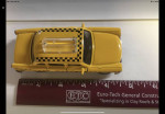 Vintage toy checker taxi pull back