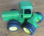 JOHN DEERE FOUR WHEEL DRIVE TOY TRACTOR