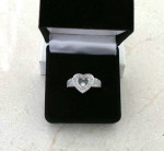 floating diamond in heart shape ring