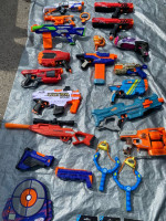 (21) PIECE NERF GUN COLLECTION + (5) BOXES OF AMMO OVER $600 VALUE !