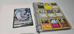 Binder full of Pokemon Cards (271 cards total) Folder with Sheets