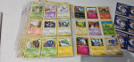Binder full of Pokemon Cards (271 cards total) Folder with Sheets