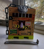 Crate Creature Surprise Sizzle  Free your beast trapped in the Crate.