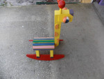 Cute "Rocking" Giraffe brightly painted. Some wear on rockers.