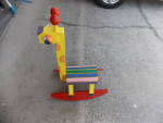 Cute "Rocking" Giraffe brightly painted. Some wear on rockers.