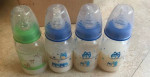 9 baby bottles with fake milk for reborn dolls
