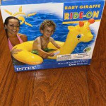 Brand new in box INTEX ride on baby giraffe pool floaty with handles