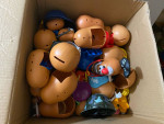 lot of potatos head with accesories