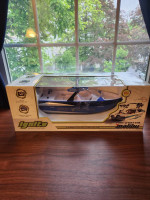 Malibu Wake Setter R/C boat, new, in box.