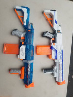 Two NERF Retaliator Dart Blasters