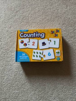 2 Puzzles - $5 for both  First Color Dominoes - $5  Counting Puzzle $5