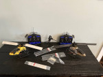 R/C helicopters pair of them remotes and extra parts