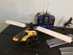 R/C helicopters pair of them remotes and extra parts