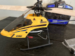 R/C helicopters pair of them remotes and extra parts