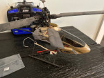 R/C helicopters pair of them remotes and extra parts