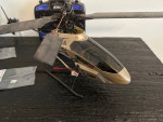 R/C helicopters pair of them remotes and extra parts