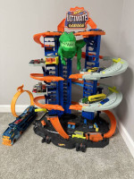Hot Wheels Toy Car Track Set Ultimate Garage Moving T-Rex Dinosaur