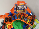 Hot Wheels Toy Car Track Set Ultimate Garage Moving T-Rex Dinosaur