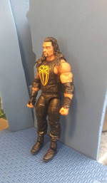 Roman Reigns wrestling figure