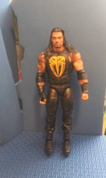 Roman Reigns wrestling figure
