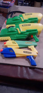 4 large squirt guns and wiffle ball set