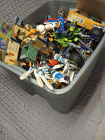 Huge bin full of assorted legos and minifigs