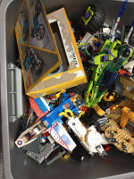 Huge bin full of assorted legos and minifigs