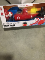 Remote control speedboat racer