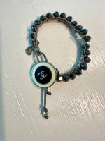 Bracelet with authentic Chanel Button