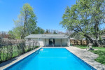 brand new Stainless Steel Appliances(2025), bar height breakfast bar, dining area, laundry storage room